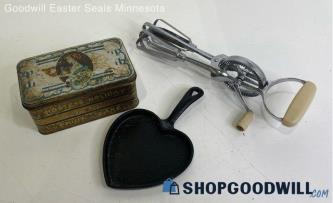 Lot Of 3pc Vintage Hand Mixer, Fruit Cake Tin Box & Heart Cast Iron Skilltet