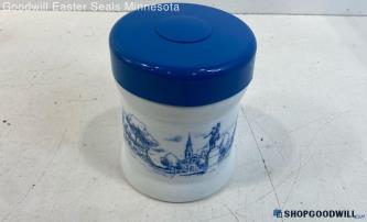 Unlabeled White Glass With Blue Plastic Lid Kitchen Storage Container