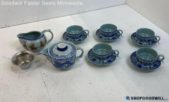 Unlabeled Ceramic Mini Tea Set W/Tea Pot 5 Cups And Saucers Creamer & Strainer