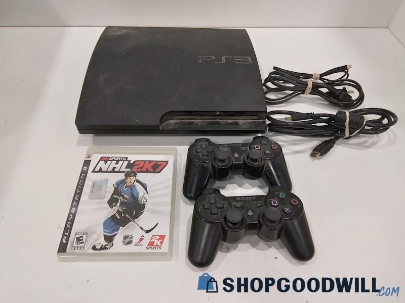 PlayStation 3 Console W/Games, Cords and Controllers-powers on