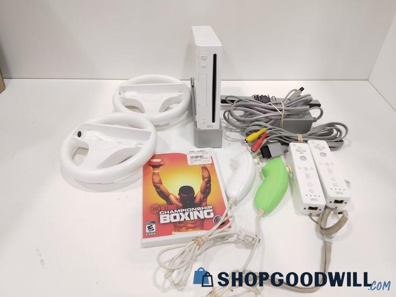 Nintendo Wii Console W/Game, Cords and Controllers-powers on