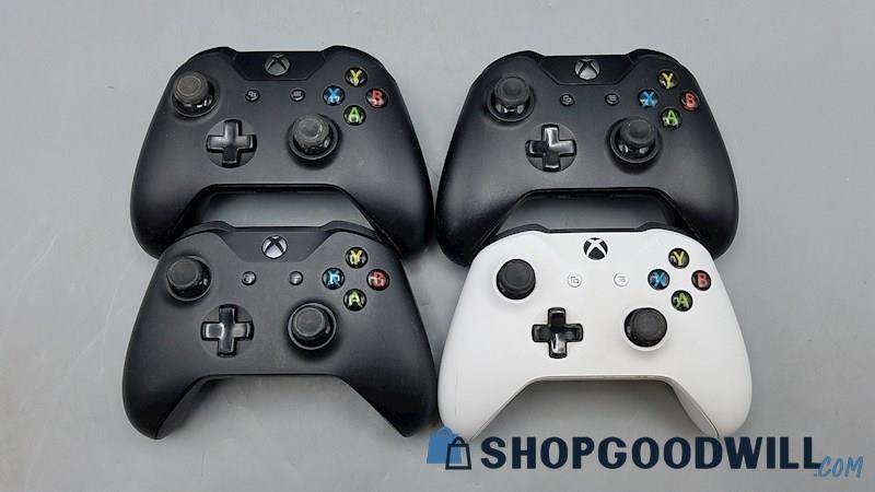  B) Lot of 4 Xbox One Controllers (Black & White)
