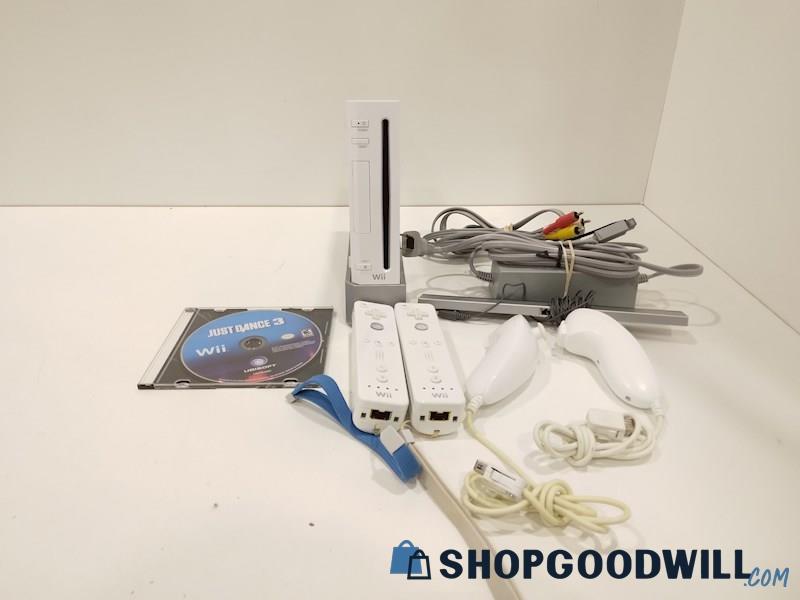 Nintendo Wii Console W/Game, Cords and Controllers-powers on