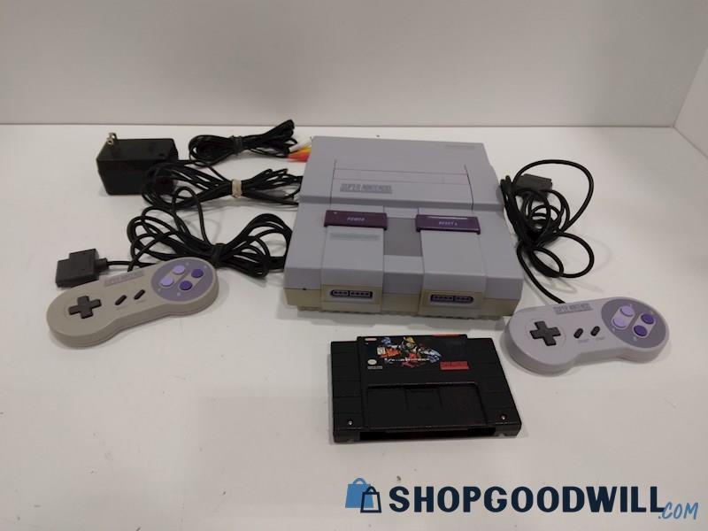 Nintendo Super NES Console W/Game, Cords and Controller-powers on