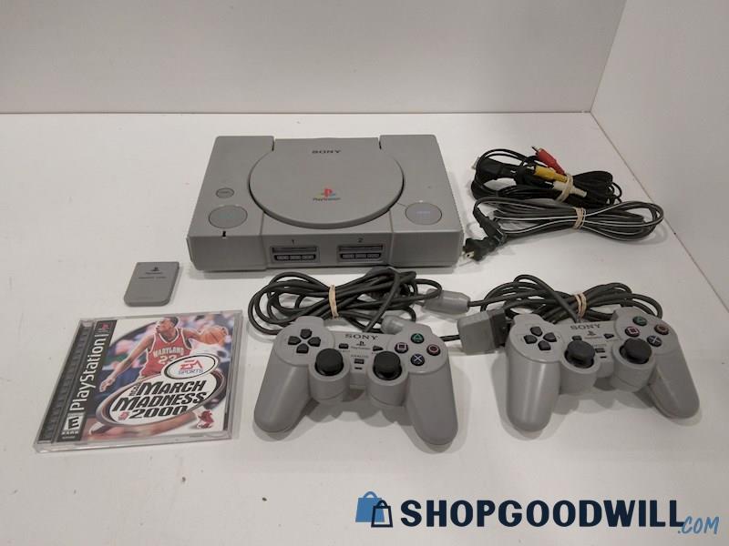 PlayStation Console W/Game, Cords and Controllers-powers on