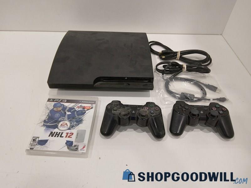 PlayStation 3 Console W/Game, Cords and Controller-powers on