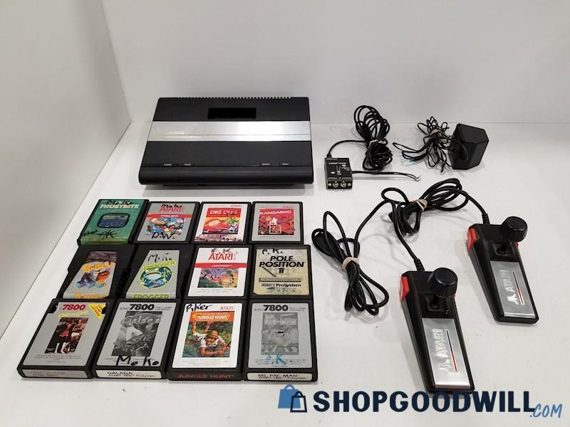 Atari 7800 Console w/ Games, Cords, Controllers - POWERS ON