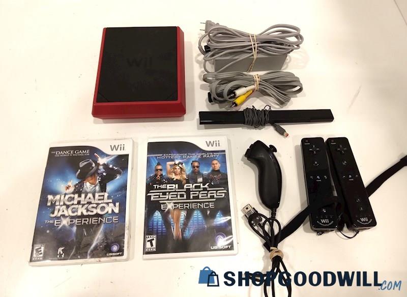 Nintendo Wii Mini Console W/Game, Cords and Controllers-powers on
