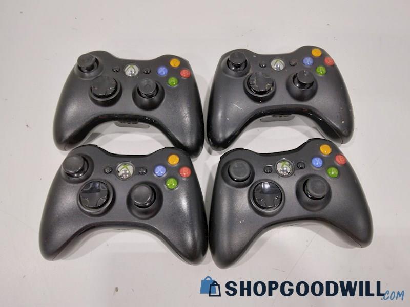 4 Black XBOX 360 Wireless Controllers-powers on