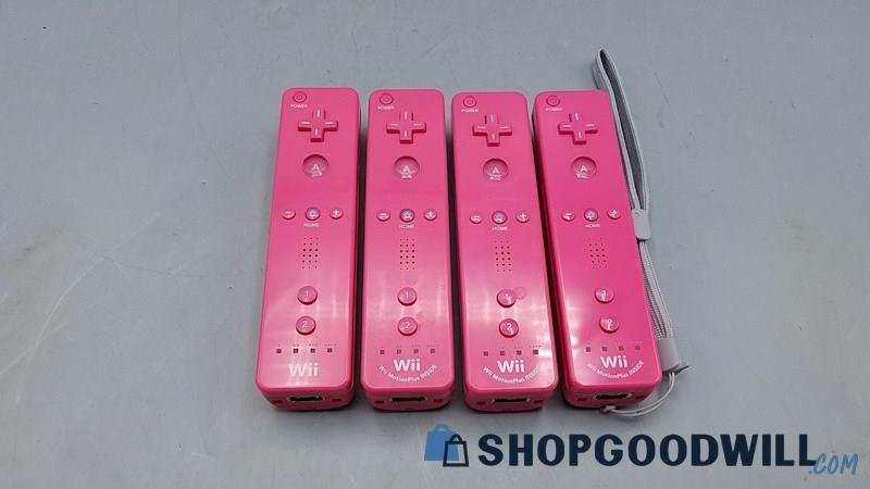  4 Nintendo Wii Remote Controllers Pink Wiimotes - Powers On (3 Plus 1 Regular)