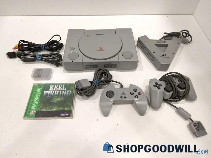 PlayStation Console W/Game, Cords and controller