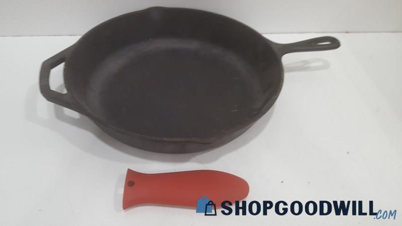 Lodge Cast Iron Skillet W/Red Silicone Hot Handle Holder
