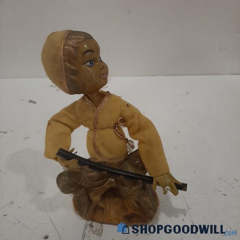 Unbranded Figure In Yellow Holding Pipe 