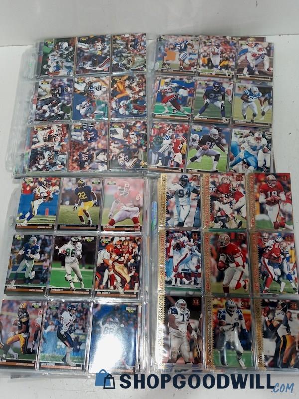 Q) Mixed Lot of Sports Cards in Sleeves 