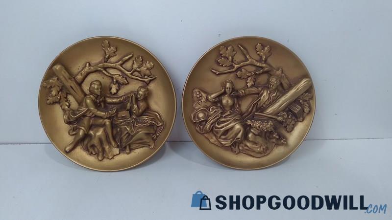 Set of 2 Embossed Wall Plaques Colonial Man and Woman Brass Color