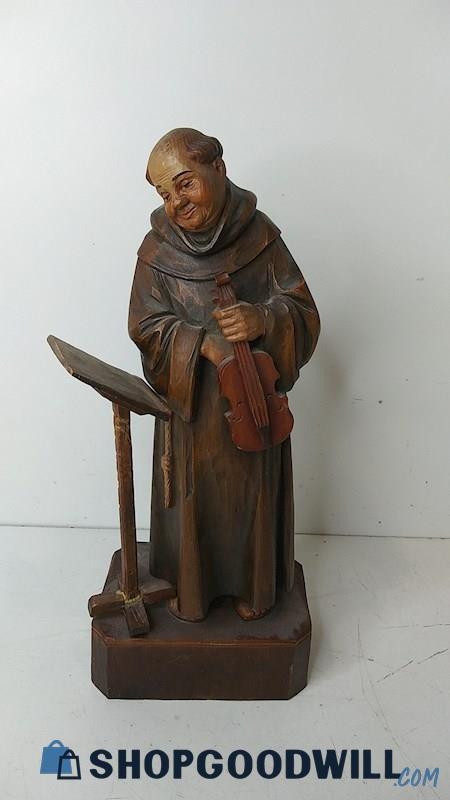 Wood Carving of Man Playing Violin