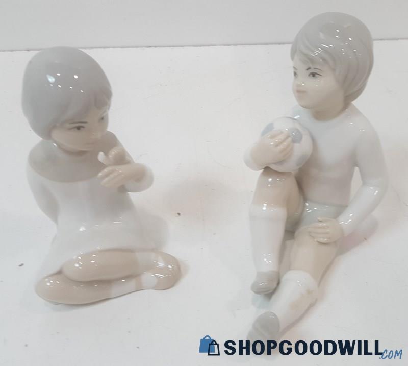 Vtg Porceval Girl Snail Porcelain Figurine / Boy Holding A Soccer Ball 