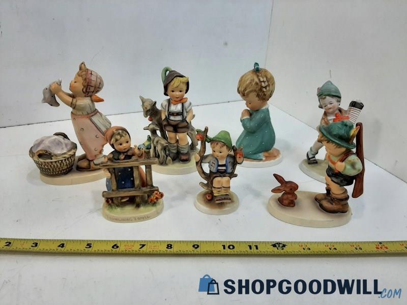 6 Goebel Hummel Figurines and 1 Similar Figurine 