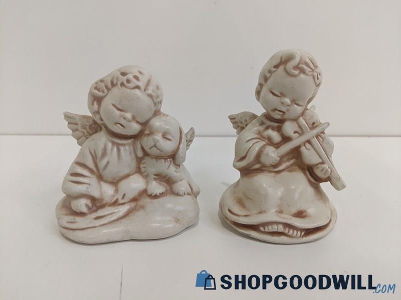 Set Of 2 Ceramic Angel Baby Cherubs White & Pink Tone Violin & Puppy Figurines