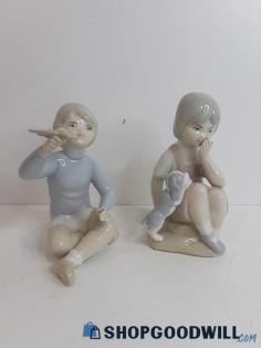 Set of 2 Porcelain Porceval Girl with Puppy & Boy with Airplane Figurines