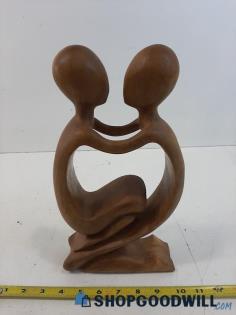 Unlabeled Wooden Carved Figure of 2 People Embracing 12" x 7" x 3"