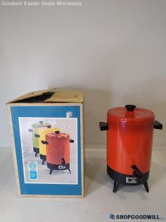 Silhouette Red/ Orange 32 Cup Automatic Coffee Maker Powered on