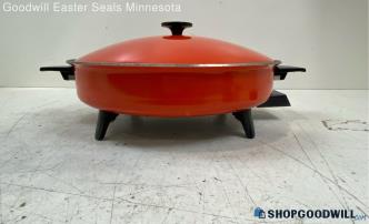 Orange Electric Skillet Powered on