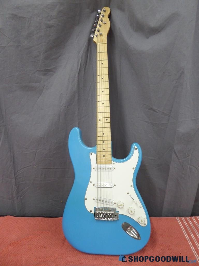 Solid Wood Powder Blue Electric Guitar - shopgoodwill.com