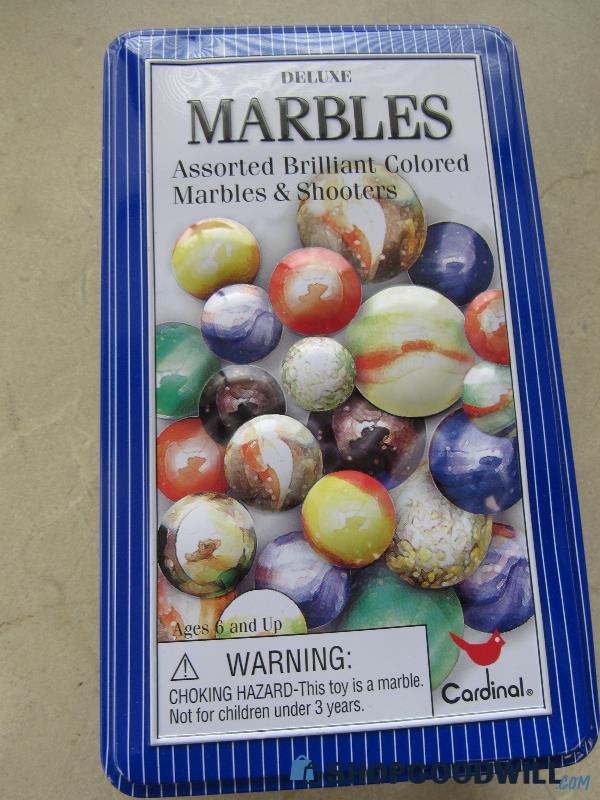 Deluxe Marbles In Tin Can | ShopGoodwill.com