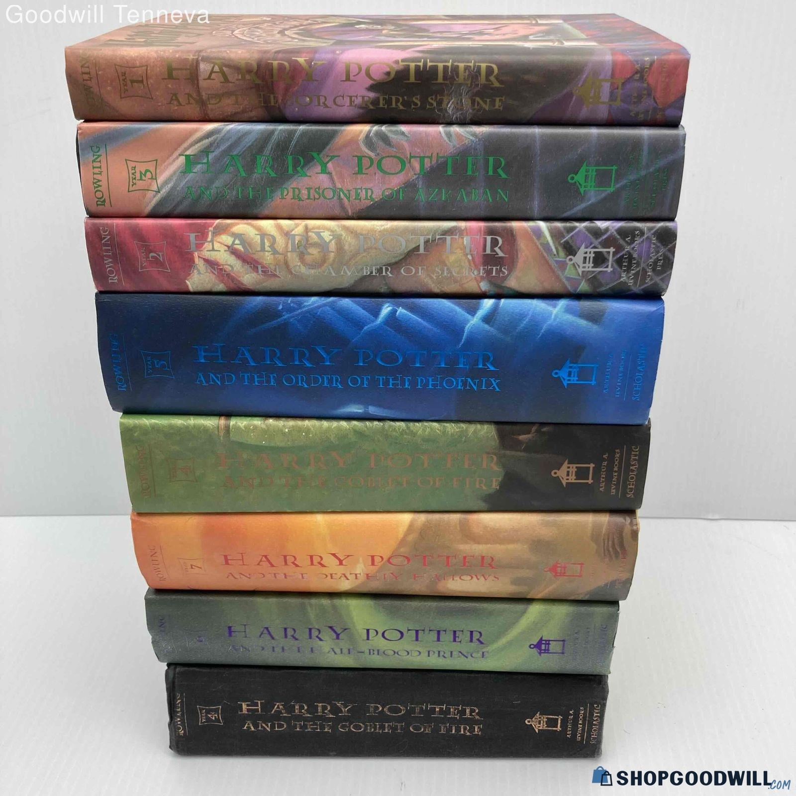 8 Harry Potter Hardback Books - shopgoodwill.com