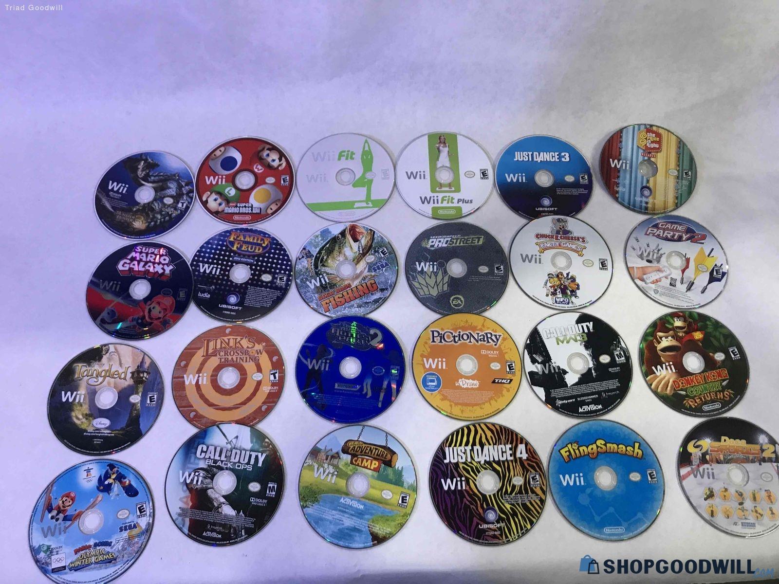 Nintendo Wii Games - 24 loose games in disk holding bag - shopgoodwill.com