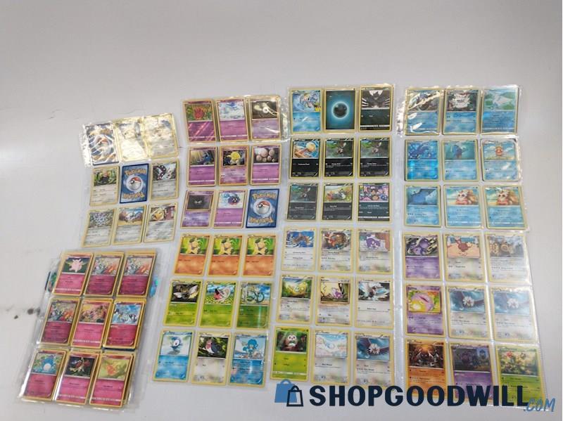 1+ LBS. of Pokemon Cards in Plastic Sleeve Pages - shopgoodwill.com